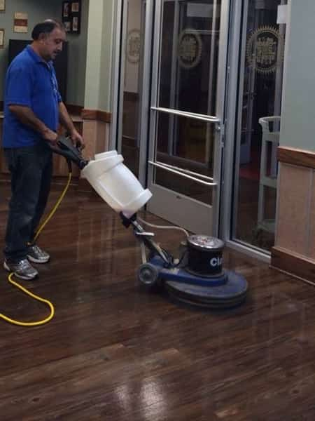 man buffing floor